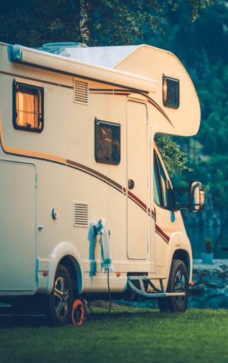 Motorhome by lake image website 706 x 530