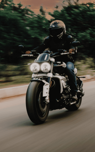 Rider on road with Motorcycle 706 x 530